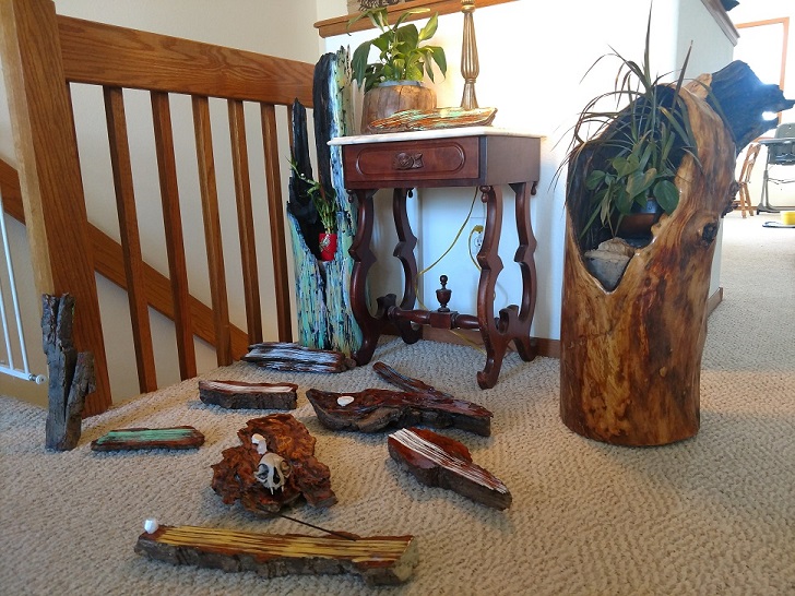 A collection of wooden art pieces